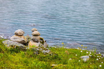 Stones stack on lake shore, Norway