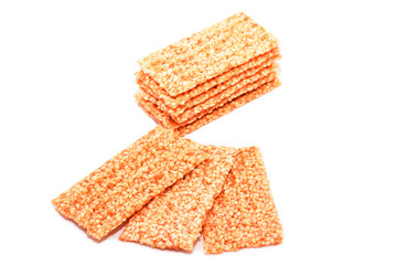 Sesame bars with honey isolated on white