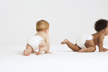 Baby boys crawling isolated on white background - Powered by Adobe