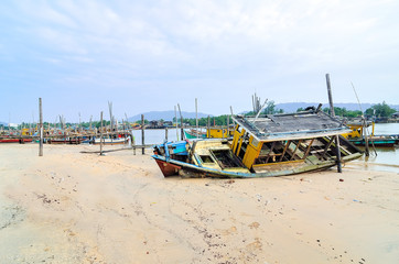 Abandoned boat at boat jetty