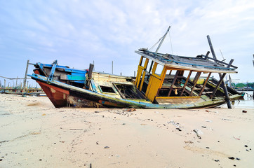 Abandoned boat at boat jetty