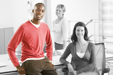 Obraz premium Portrait of confident multiethnic business people in office