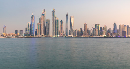 Fototapeta na wymiar Fraction of Dubai skyline in the Marina district at sunset.