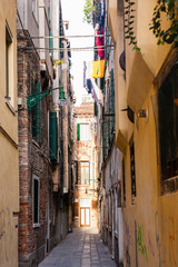 Fototapeta na wymiar narrow street in central district of Venice