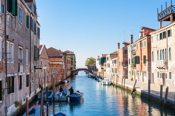 Fototapeta na wymiar canal and houses in Cannaregio in Venice city