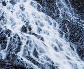 Naklejka premium Cascade waterfall low angle view