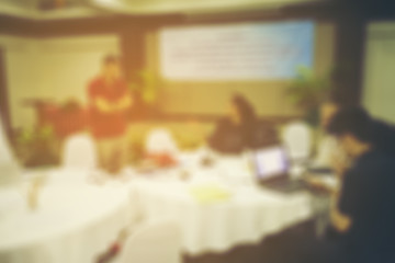 Businessman blur in the workplace.Table Top And Blur Office of B