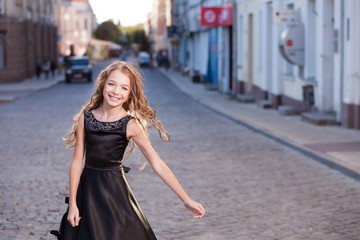 Smiling girl in the street