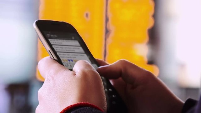 woman using smartphone to send messages with social network: whatsapp, facebook