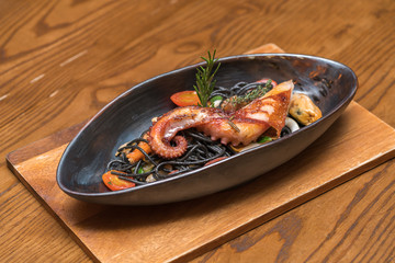 Black spaghetti spicy seafood.
