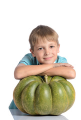 Fototapeta premium Cute boy with pumpkin