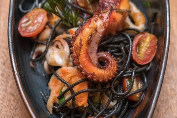 Black spaghetti spicy seafood.
