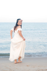 Fototapeta na wymiar Outdoor Bride on the beach in the evening.