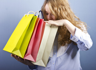 young pregnant blond woman on shopping.woman couple shopping portrait. Shopping bags.
