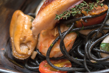 Black spaghetti spicy seafood.
