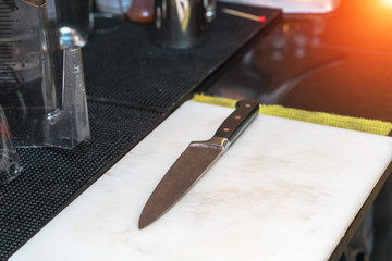 Knife on cutting board

