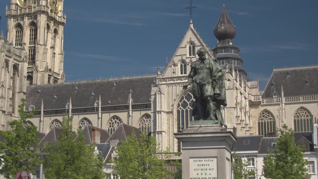 CLOSE UP: Impressive Cathedral of Our Lady behind Petro Paulo Rubens statue 