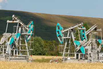 Fototapeta na wymiar oil pump. Oil industry equipment. filtered picture of oil pump j