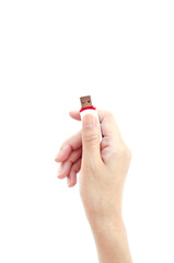 Flash drive in hand isolated on white background.