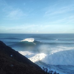 big wave surfing in Nazaré, Portugal © sewu