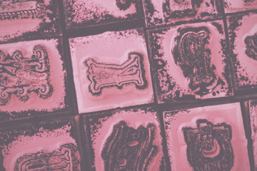 Close up of type set rubber stamps Vintage Retro Filter.
