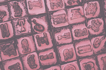 Close up of type set rubber stamps Vintage Retro Filter.