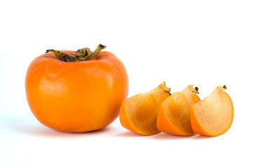 Fresh ripe persimmons isolated on white background.