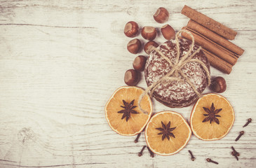 Gingerbread cookies, cinnamon and orange slices. Christmas decoration.