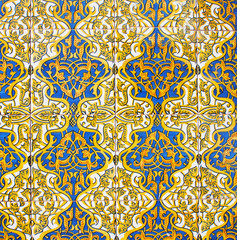 Detail of the traditional tiles from facade of old house. Decorative tiles