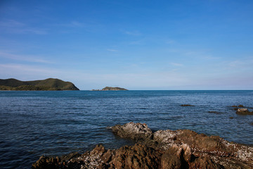 Emerald sea and blue sky and rock