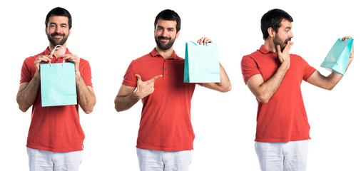 Obraz premium Handsome man with shopping bag