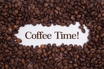 Background made of coffee beans with message 