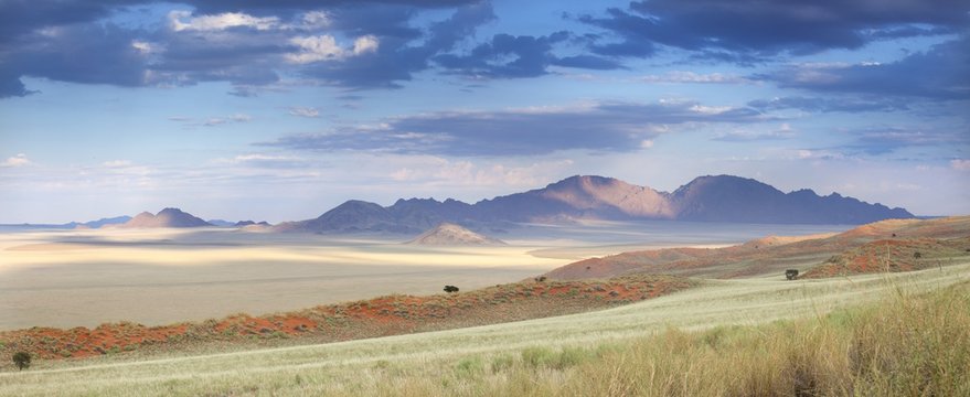 Panoramic view at dusk over the magnificent landscape of the Namib Rand game reserve, Namib Naukluft Park, Namibia