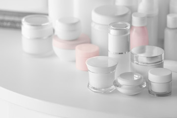 Set of cosmetics on white table, close up view
