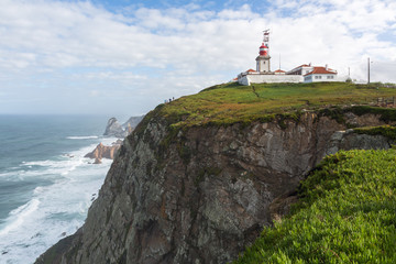 Fototapeta na wymiar Lighthouse on Cape Roca (Cabo da Roca), Sintra, Portugal. 