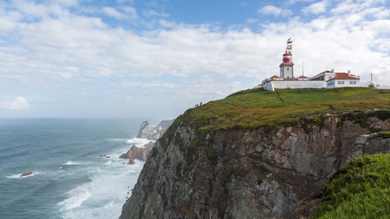 Fototapeta na wymiar Lighthouse on Cape Roca (Cabo da Roca), Sintra, Portugal. 