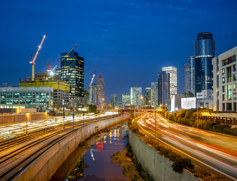 Night view of Ayalon highway over skyscrapers of Tel Aviv.