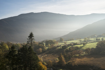 Beautiful Autumn Fall sunrise foggy landscape image over country