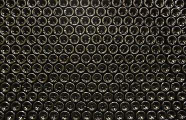 Full frame shot of bottles in wine cellar