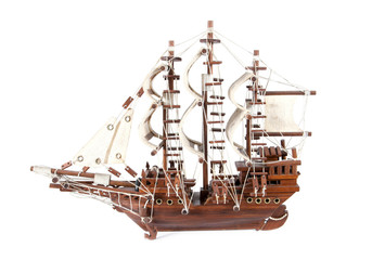 miniature model of a ship isolated on white.Wooden ship model is