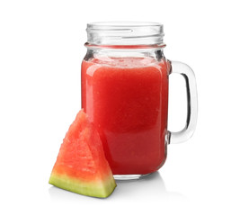 Jug with smoothie and watermelon slice isolated on white
