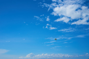 blue sky and parachute
