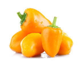 Yellow sweet peppers isolated on white