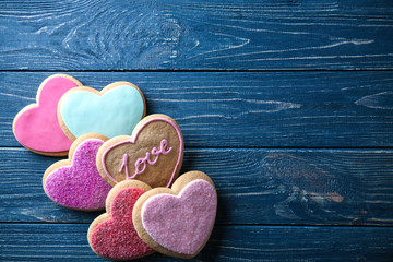 Heart shaped cookies on wooden background, closeup