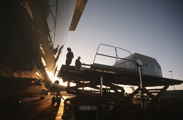 Loading freight onto Boeing 727 jet aircraft
