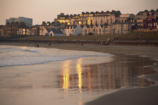 Dusk light on the beach at Portrush, County Antrim, Ulster, Northern Ireland