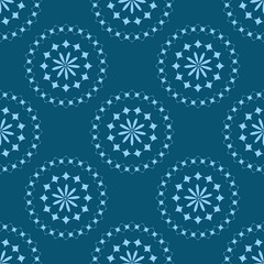 Blue floral ornament. Seamless texture. Pattern flower in the frame of abstract elements.