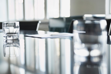Closeup of empty glasses on conference table in office