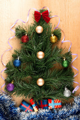 Naklejka na ściany i meble Christmas, Christmas tree with branches, balls toys, gifts under