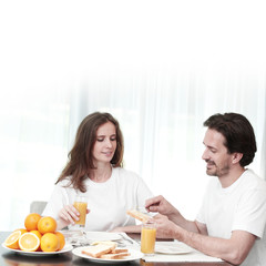 Obraz na płótnie Canvas Couple having breakfast